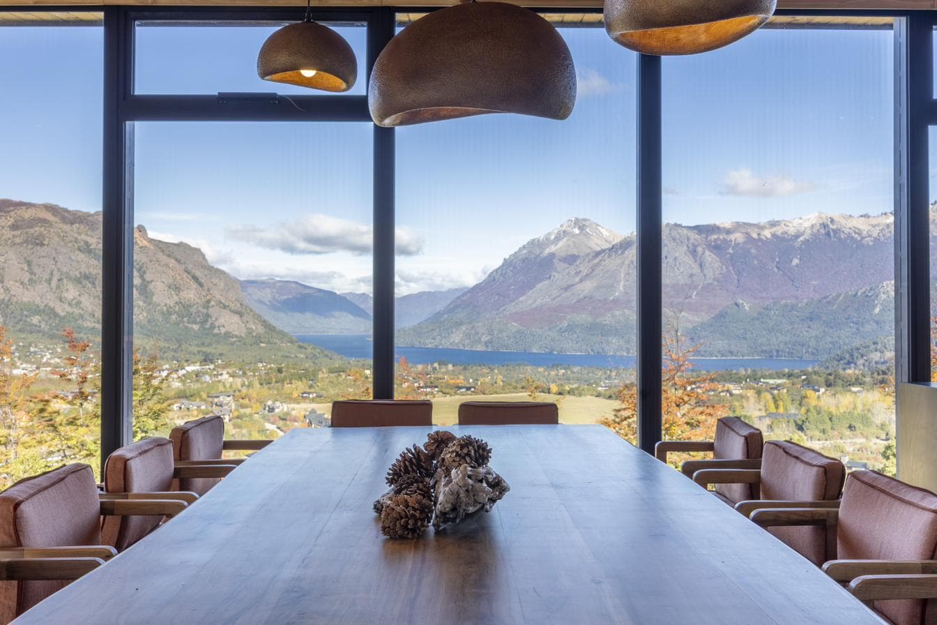 A long table overlooking the mountains and lake